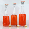 Wholesale empty new 750ml 1000ml clear round glass vodka bottle wine liquor bottle with rubber cork stopper